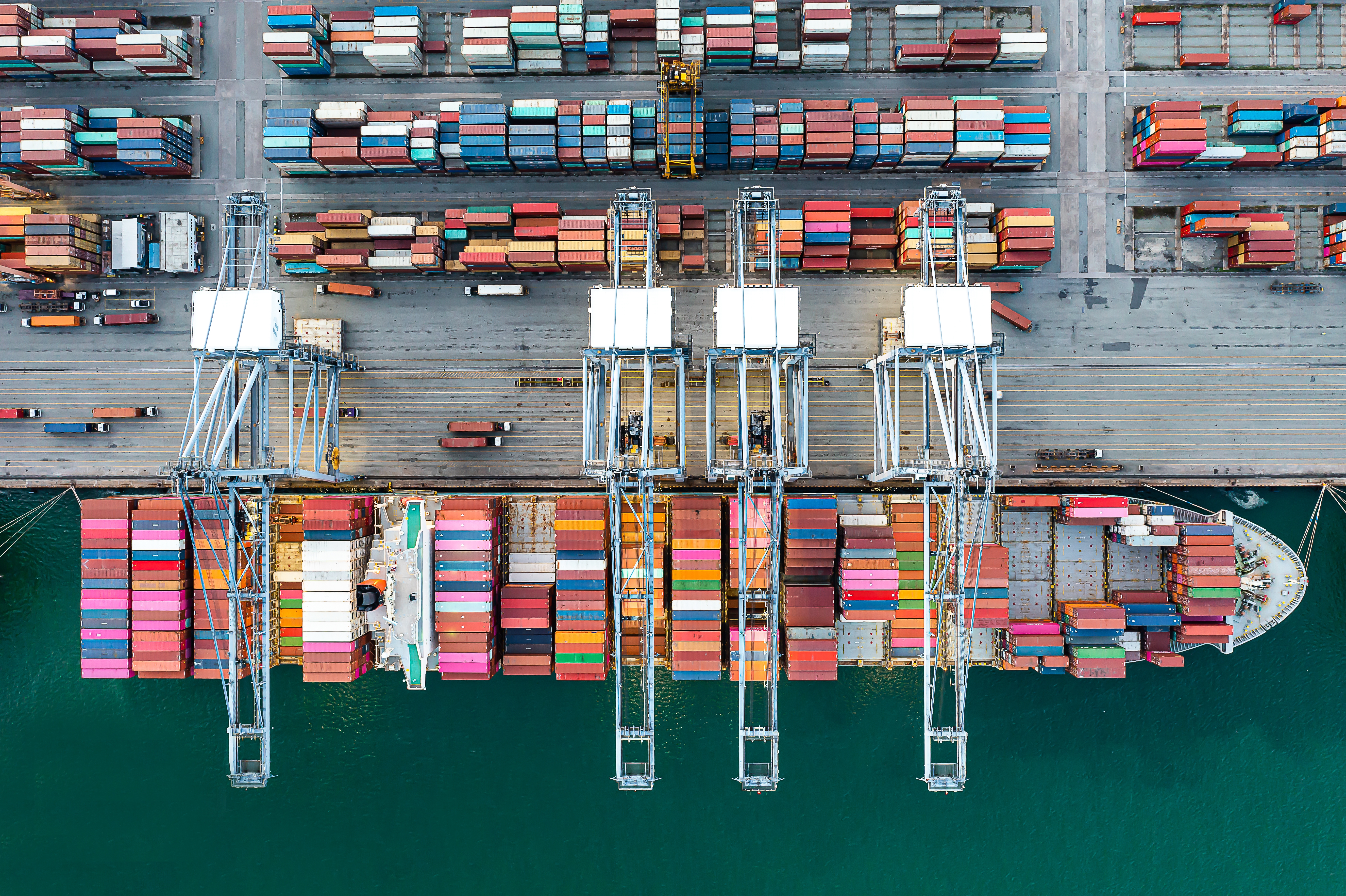 Container ships at industrial ports for Uzbekistan import route planning