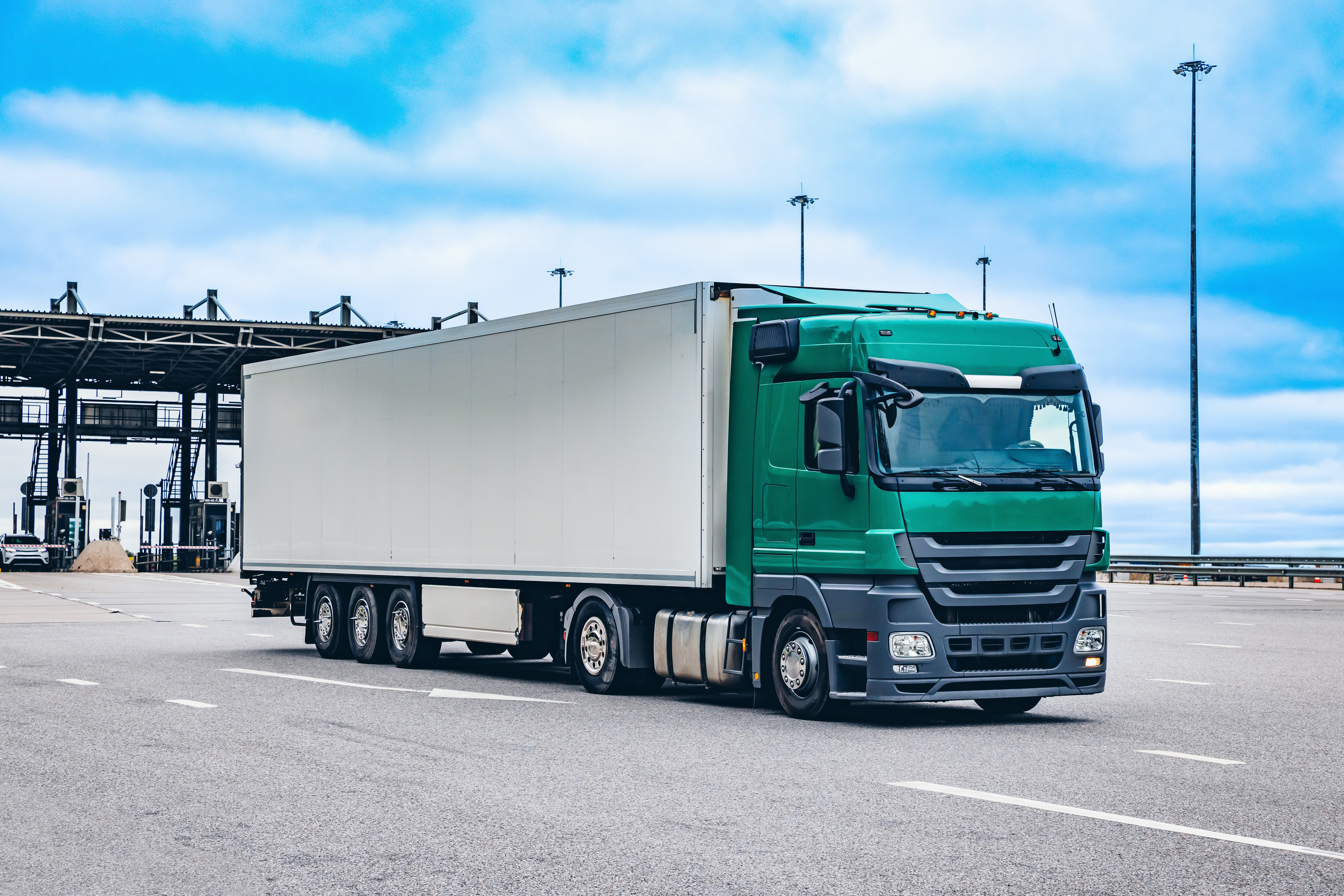 Freight truck approaching a distribution center for Central Asia logistics planning